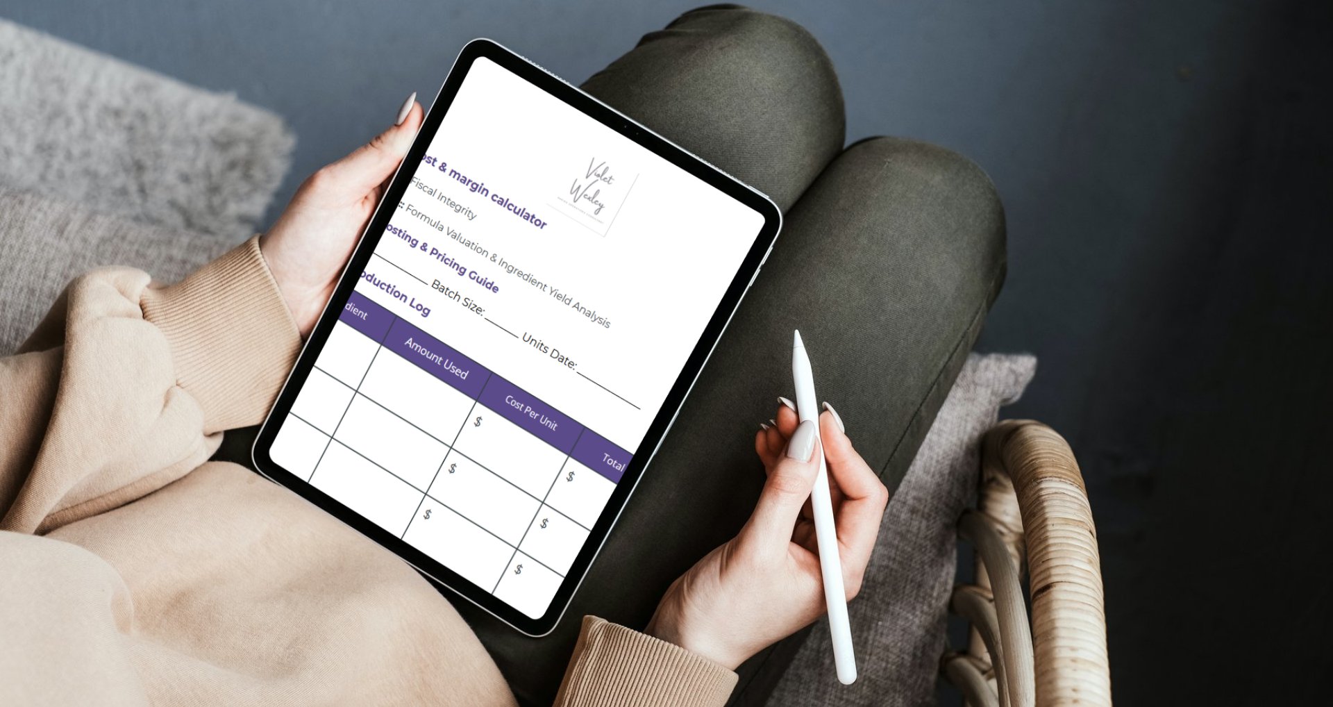 A baker reviews a Violet Wexley cost & margin tracker on a tablet